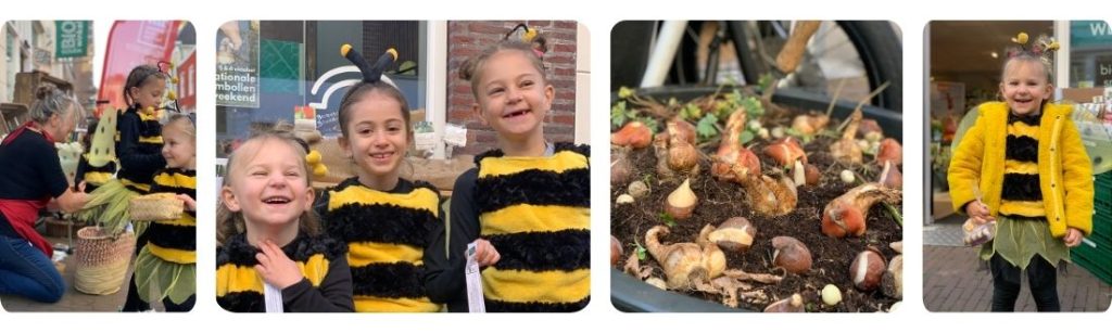 de bloembollendag met kleine bijtjes die bolletjes uitdelen op straat